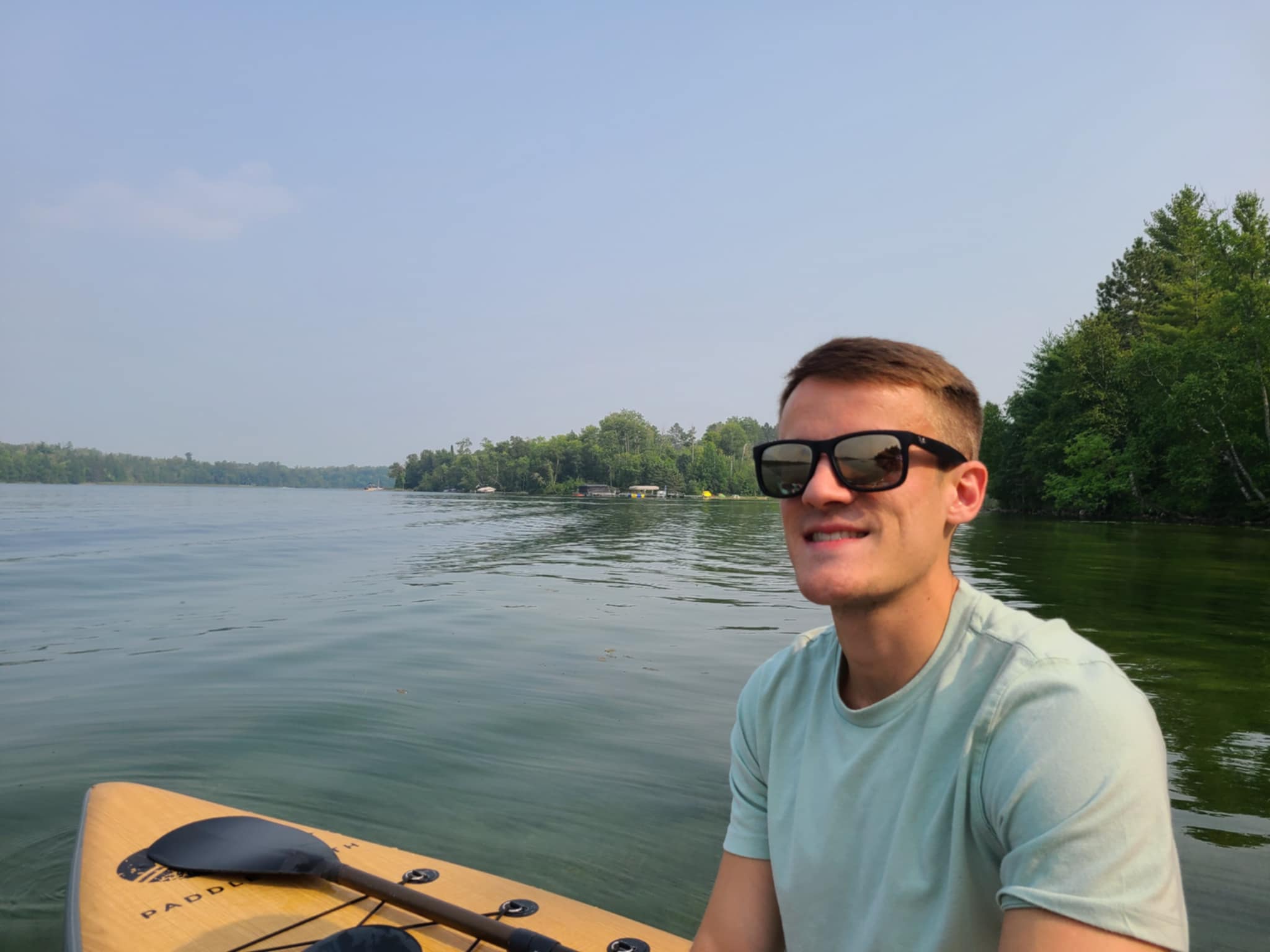 Paddle boarding on a Minnesota lake.